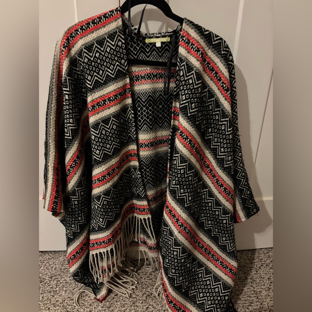 Beautiful poncho with fringe detail